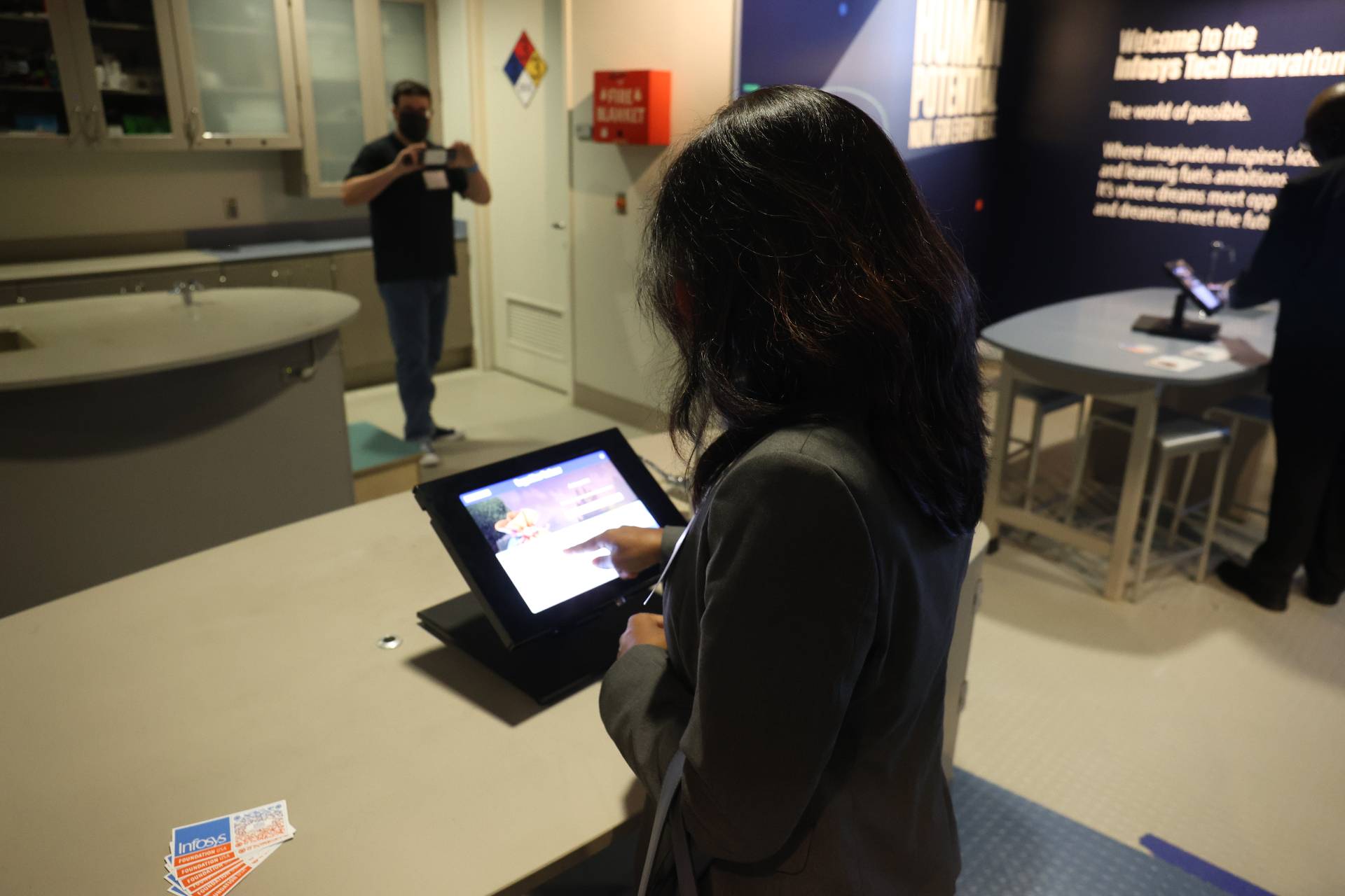 Guest using interactive tablet in the lab